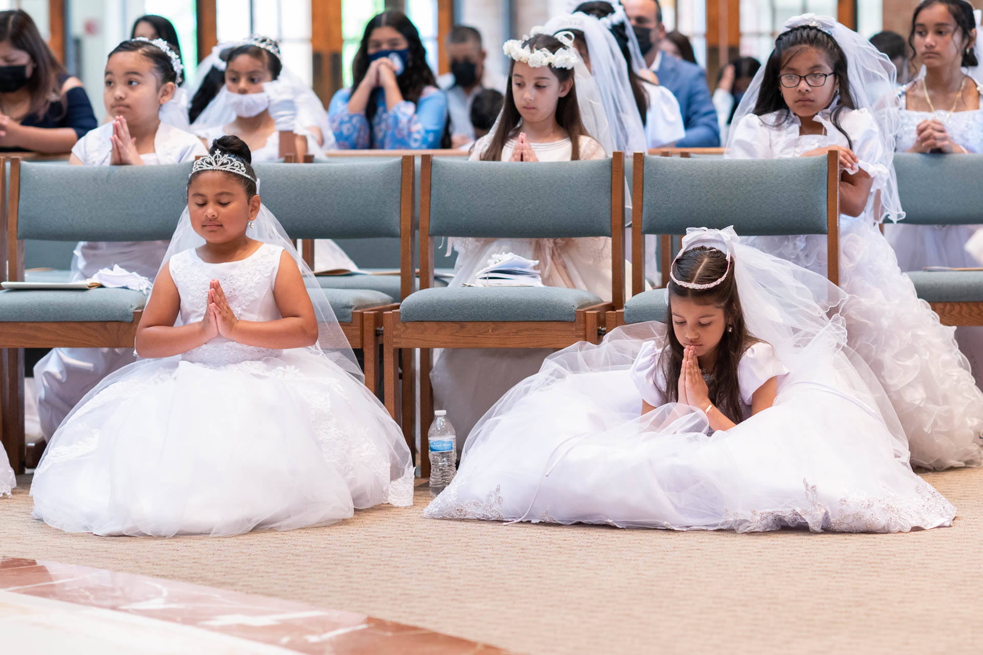 First Holy Communion kneeling